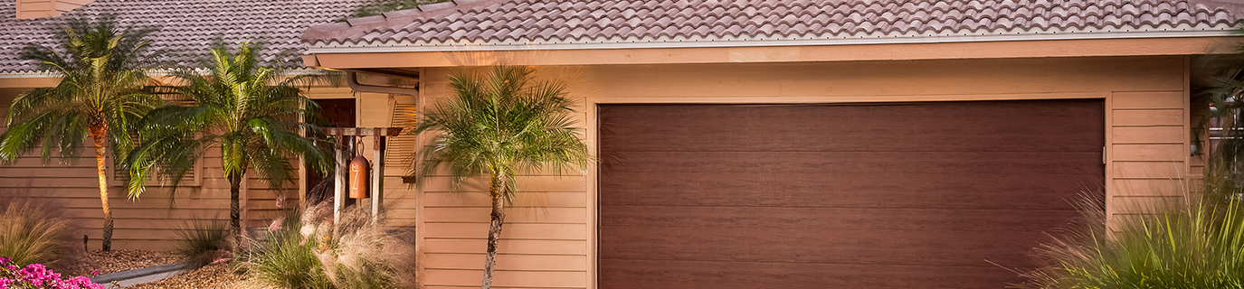 Light Brown House with Modern Wood Garage Door