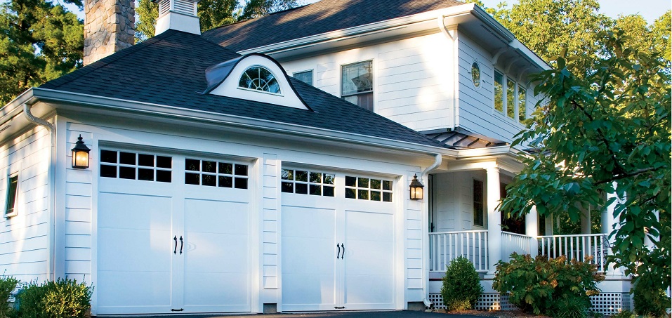 White Carriage House Garage Doors on White House