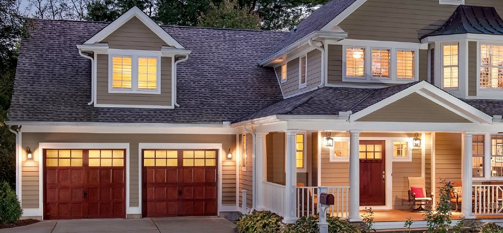 Home with Carriage House Garage Doors