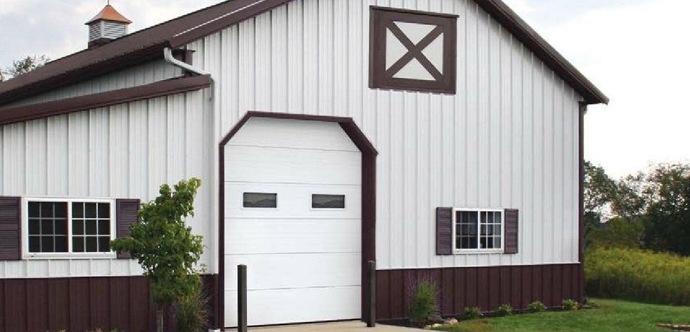 Mediterranean House with Amarr garage Doors