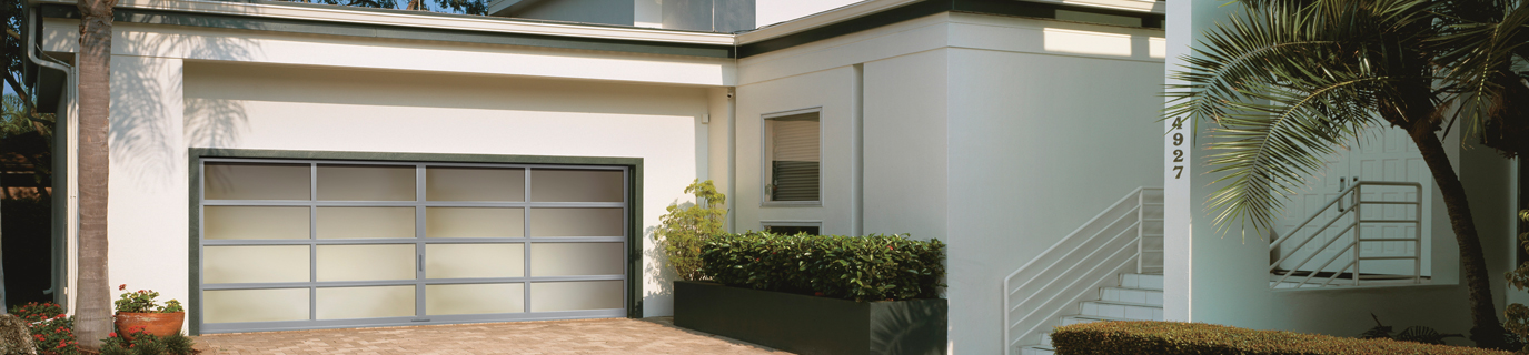 White Modern House with Avante Collection Garage Door