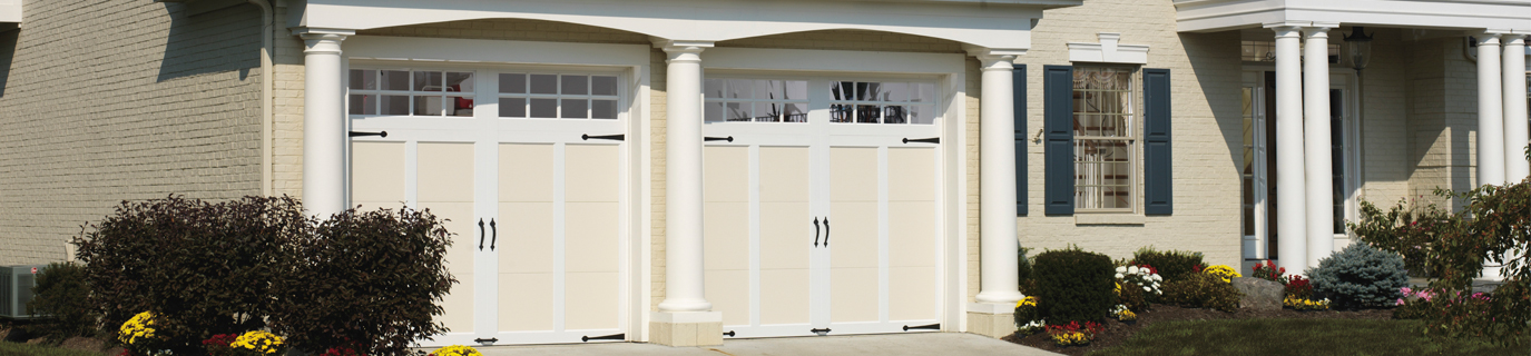 White and Yellow Coachman Garage Doors