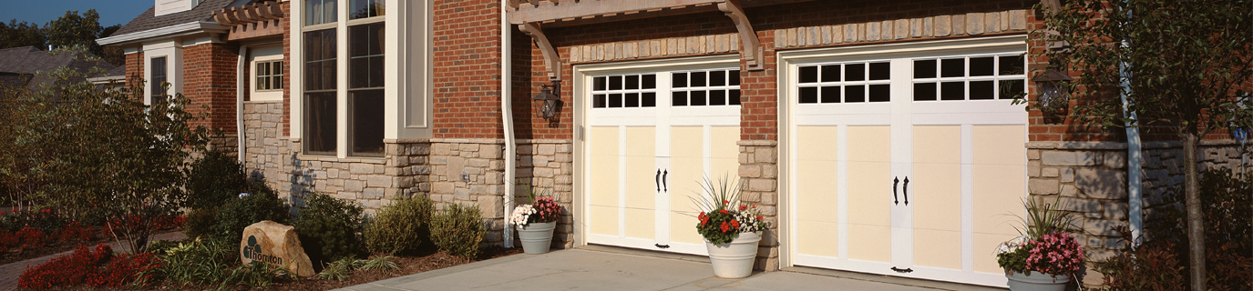 White and Yellow Carriage House Style Garage Doors