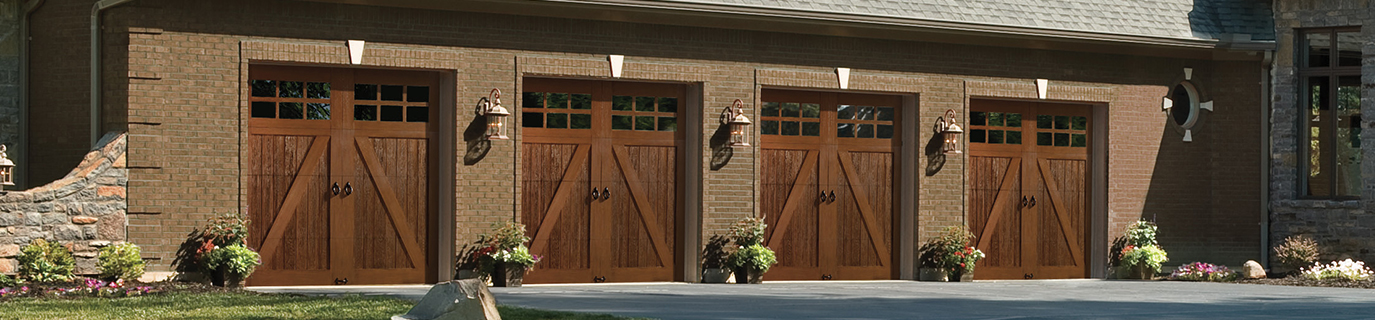 Home with 4 Wood Carriage House Garage Doors