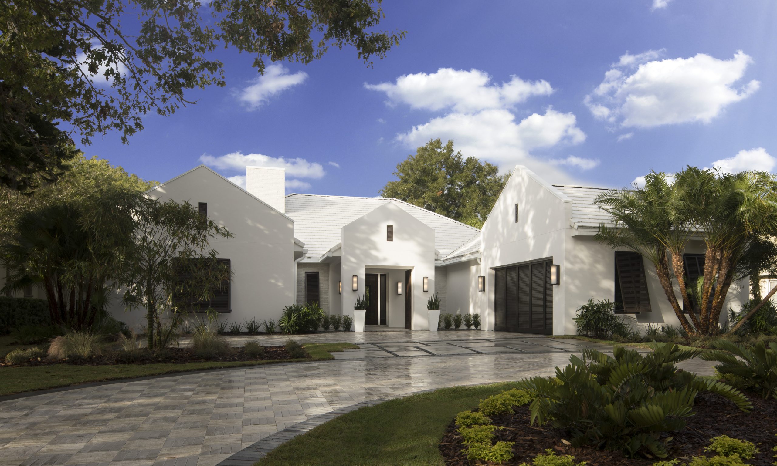 White Home with Black Garage Door