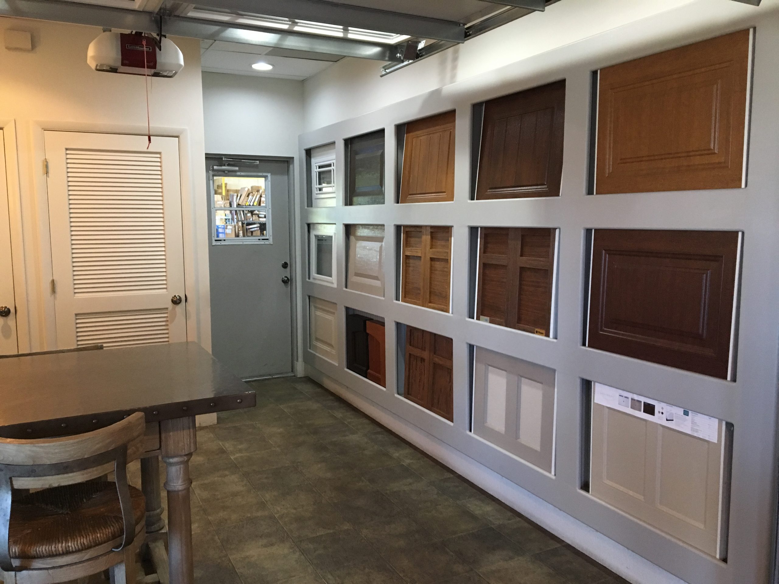 Liftmaster garage door opener, and several garage door designs from the Banko Overhead Doors, Inc. garage door showroom in Tampa.