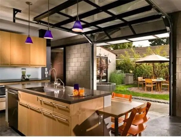 Open concept kitchen with garage door